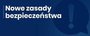 Biały napis na niebieskim tle. &quot;Nowe zasady bezpieczeństwa&quot; obok widoczny wykrzyknik.