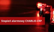 napis na czerwonym tle stopień alarmowy CHARLIE-CRP