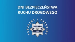 Biały napis na niebieskim tle: DNI BEZPIECZEŃSTWA RUCHU DROGOWEGO. Poniżej odznaka policyjna otoczona napisem: POMAGAMY I CHRONIMY