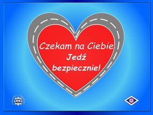 Na niebieskim tle czerwone serce w szarej obwolucie stylizowanej na jezdnię i w środku napis: Czekam na Ciebie - Jedź bezpiecznie! Po lewej stronie poniżej gwiazda policyjna a po prawej logo ruchu drogowego